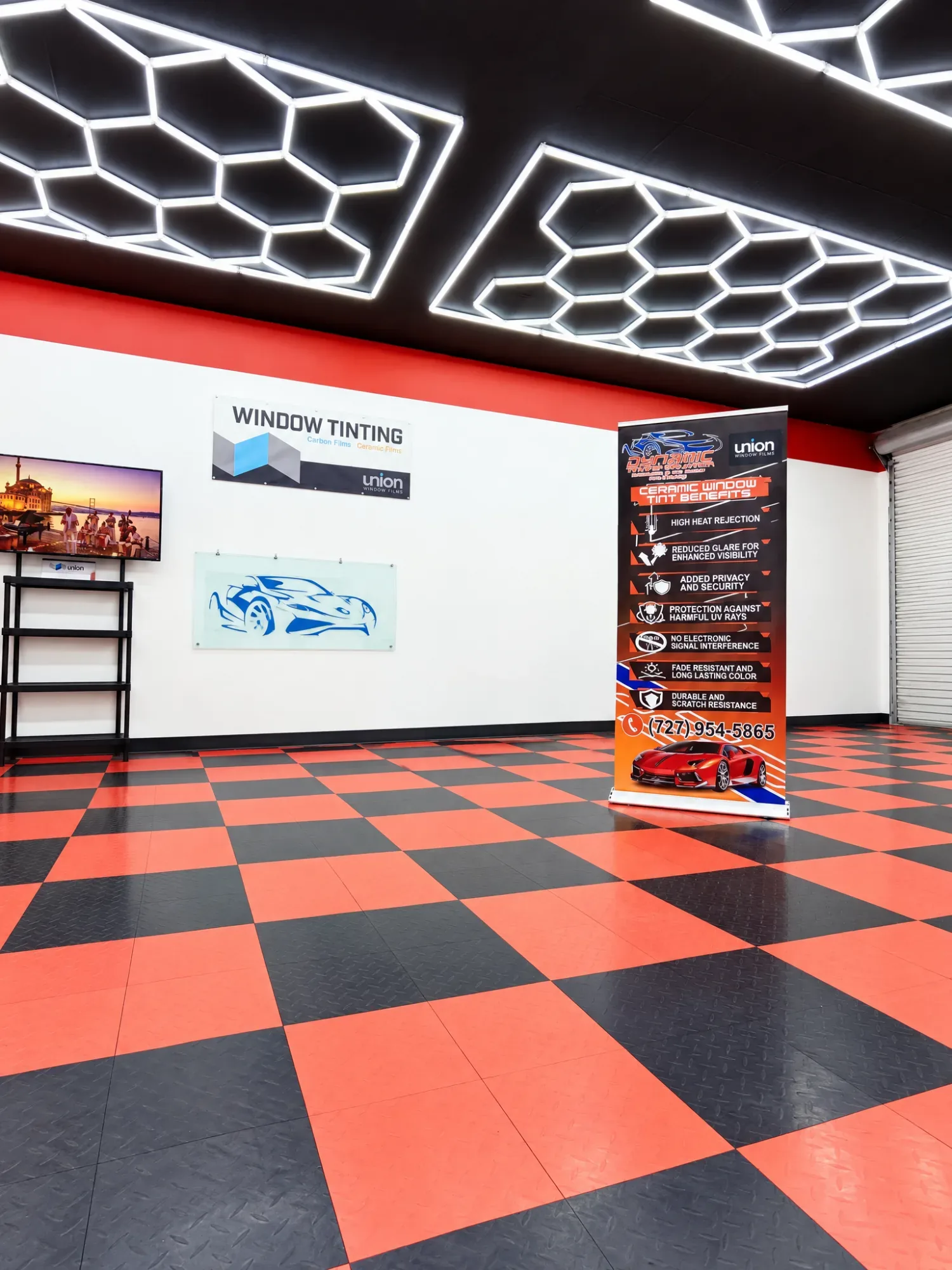 The Union Window Films sign and the Dynamic Tinting Solution banner in their Largo shop